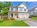 Inviting two-story home with a covered porch and a well-maintained front yard at 4230 Old Cherokee St, Acworth, GA 30101