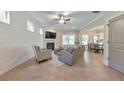 Cozy living room features a fireplace, hardwood floors, and ample natural light at 4230 Old Cherokee St, Acworth, GA 30101
