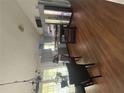 Modern kitchen with stainless steel appliances and an island with chairs at 6070 Ridge Way, Douglasville, GA 30135