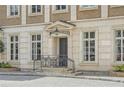 Close up shot of the front entrance of the townhome showing the detailed stonework at 2440 Peachtree Nw Rd # 9, Atlanta, GA 30305