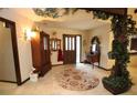 Inviting foyer with tile floors, decorative accents, and a view of the front door at 3353 Greenfield Dr, Marietta, GA 30068