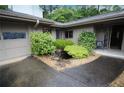 Front entrance featuring a small decorative water feature and a covered entryway at 3353 Greenfield Dr, Marietta, GA 30068