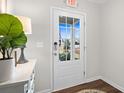 Bright and cheerful exterior door featuring a glass pane design and chrome accents at 295 Cranston Dr, Canton, GA 30114