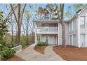 Condominium exterior showcasing the walkways that lead to the front door at 204 Countryside Se Pl # 204, Smyrna, GA 30080