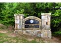 Stone park entrance sign for Windermere Park with Forsyth County Parks & Recreation logo at 6009 Castleton Mnr, Cumming, GA 30041