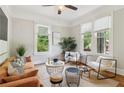 Bright living room with hardwood floors, neutral walls, and stylish contemporary furniture at 34 Clifton Se St, Atlanta, GA 30317
