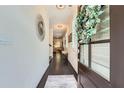 Inviting entryway with hardwood floors and modern decor leads into a bright and airy home at 351 Gaines St, Marietta, GA 30060