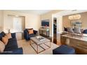 Well-lit living room with an open floor plan, modern furniture, and hardwood floors, ideal for entertaining at 215 Piedmont Ne Ave # 507, Atlanta, GA 30308
