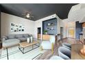 Open concept living space boasting a modern design, wood floors, and decorative accents at 3400 Malone Dr # 303, Atlanta, GA 30341