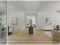 Bright living room with hardwood floors, elegant decor, and an open floor plan at 27 Maddox Ne Dr, Atlanta, GA 30309