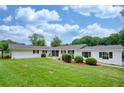 Lovely home featuring beautiful landscaping and a lush green lawn at 3125 Cardinal Lake Cir, Duluth, GA 30096