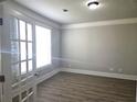 Bright office space with a French door entry, large window, and hard surface floors at 232 Clubhouse Xing, Acworth, GA 30101