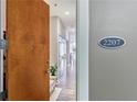A view of a doorway displaying the suite number, leading into a bright and well-lit hall at 560 Dutch Valley Ne Rd # 2207, Atlanta, GA 30324