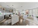 Open-concept living space featuring a modern kitchen, spacious living room, and elegant decor at 560 Dutch Valley Ne Rd # 2207, Atlanta, GA 30324