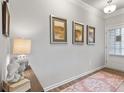 Bright foyer featuring stylish decor, wood flooring and a front door with sidelight at 14 Jacobs Farm Ln # 7, Lawrenceville, GA 30045