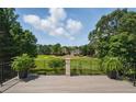 Beautiful deck overlooking a lush golf course at 1409 Spyglass Hill Dr, Johns Creek, GA 30097