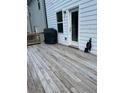 Spacious back deck overlooking backyard at 409 Ruths Blvd, Woodstock, GA 30188
