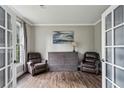 Cozy office/study featuring hardwood floors and natural light at 321 Woodbrook Crst, Canton, GA 30114