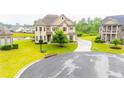 Lovely home exterior in manicured cul-de-sac with a well-kept yard and an inviting driveway at 6390 Yellow Birch St, Cumming, GA 30040