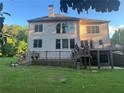 Spacious backyard with an expansive deck ideal for outdoor entertaining and leisure at 2785 Old Sewell Rd, Marietta, GA 30068