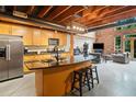 Modern kitchen with stainless steel appliances, granite countertops, and breakfast bar at 319 Atlanta Se St # 315, Marietta, GA 30060