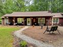 Relaxing front porch with comfortable seating, perfect for enjoying the outdoors at 712 Honeysuckle Ln, Temple, GA 30179