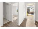Inviting entryway with wood floors, leading into a bright, new construction home at 3933 Fairhaven Rd, Lithia Springs, GA 30122