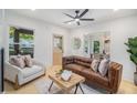 Bright living room with stylish furniture, natural light, and views to the front porch at 1227 Epworth Sw St, Atlanta, GA 30310