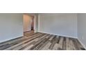 Inviting living room showcasing stylish flooring, creating a cozy and modern atmosphere at 5136 Estonian Dr, Fairburn, GA 30213