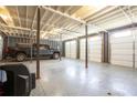 Spacious garage with epoxy floors, multiple doors, and ample space for parking at 5322 Seaton Dr, Atlanta, GA 30338