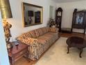 Cozy living room with a comfortable sofa, accent tables, and elegant decor at 3662 Greentree Farms Dr, Decatur, GA 30034
