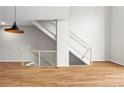 Unique metal railing staircase, complemented by light-colored walls at 1271 Ponti Nw Mews # 92, Atlanta, GA 30318