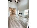 Bright living room with tall ceilings and a modern fireplace; perfect for relaxing or entertaining at 123 Deer Xing, Temple, GA 30179