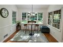 Cozy breakfast nook filled with natural light, featuring an inviting table and seating at 1461 Fox Forest Sw Ter, Lilburn, GA 30047