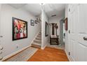 Welcoming foyer with hardwood floors and staircase at 200 Valley Xing, Canton, GA 30114