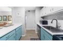 Stylish kitchen with blue cabinets, stainless steel appliances, and ample counter space at 2707 Cumberland Se Ct, Smyrna, GA 30080