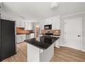 Kitchen featuring white cabinets, granite countertops, and stainless steel appliances at 5659 Brookstone Nw Dr, Acworth, GA 30101