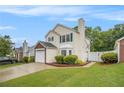 Well-maintained two-story home with green shutters and manicured lawn at 3979 White Owl Nw Ct, Duluth, GA 30097