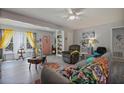 Bright living room featuring neutral walls, wood laminate flooring, and cozy furnishings for relaxation at 892 Wayland Ct, Smyrna, GA 30080