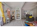 Comfortable living room with built-in shelving, wood laminate flooring, and a welcoming atmosphere at 892 Wayland Ct, Smyrna, GA 30080