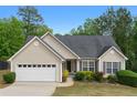 Charming single-Gathering home featuring a two-car garage and well-maintained landscaping at 4219 David Austin Ct, Snellville, GA 30039