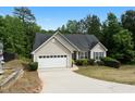 Charming single-Gathering home featuring a two-car garage and well-maintained landscaping at 4219 David Austin Ct, Snellville, GA 30039
