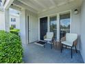 Cozy front patio with seating, perfect for enjoying the outdoors at 1150 Collier Nw Rd # D20, Atlanta, GA 30318