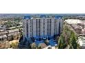 A high-rise condominium building with a stunning rooftop and manicured grounds at 2700 Paces Ferry Se Rd # 202, Atlanta, GA 30339