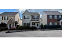 Inviting two-story home showcasing a classic design and manicured front yard at 3142 Imperial Sw Cir, Atlanta, GA 30311