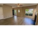 Spacious open-concept living area with hard surface floors and abundant natural light at 3142 Imperial Sw Cir, Atlanta, GA 30311