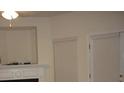 Cozy living room featuring white trim, neutral walls, and a fireplace at 2502 Walden Lake Dr, Decatur, GA 30035