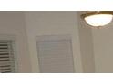 Neutral-toned room with blinds and a ceiling fan at 2502 Walden Lake Dr, Decatur, GA 30035
