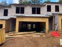 New townhome construction showcases the framing and the early stages of the building process at 1406 Lucan Nw Ln # Wc221, Lawrenceville, GA 30043
