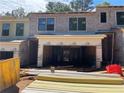 New construction of an exterior view showcasing the early building stages and architectural design in progress at 1406 Lucan Nw Ln # Wc221, Lawrenceville, GA 30043